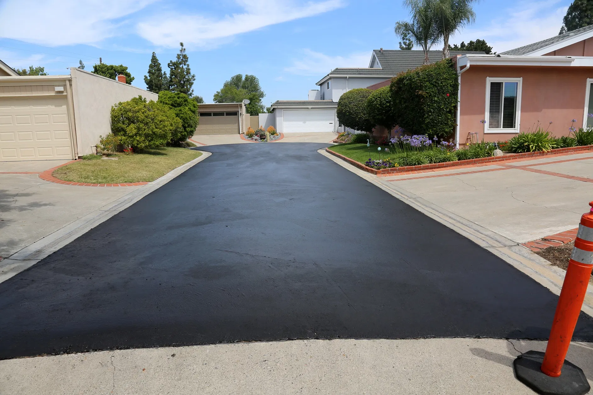 Driveway sealcoating
